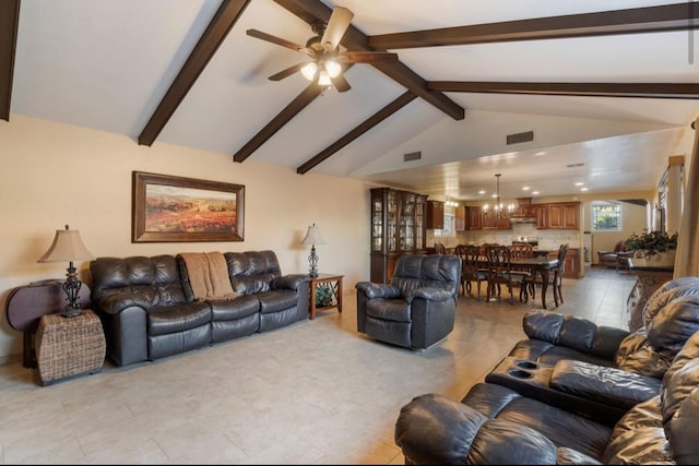 living area with lofted ceiling with beams, ceiling fan, and visible vents