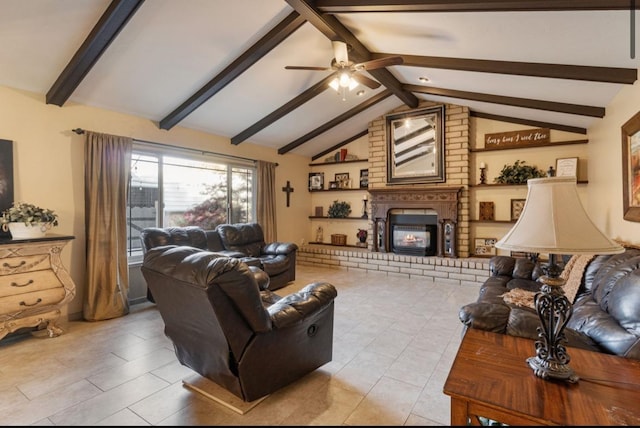 living area featuring a ceiling fan, a brick fireplace, and vaulted ceiling with beams