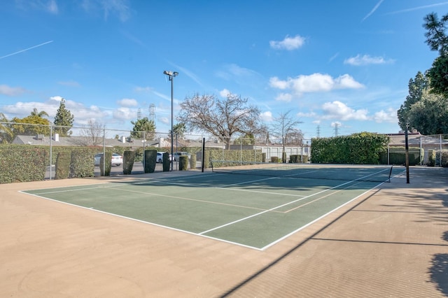 view of tennis court with basketball court