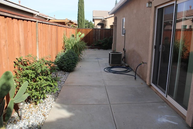 view of patio / terrace with central air condition unit