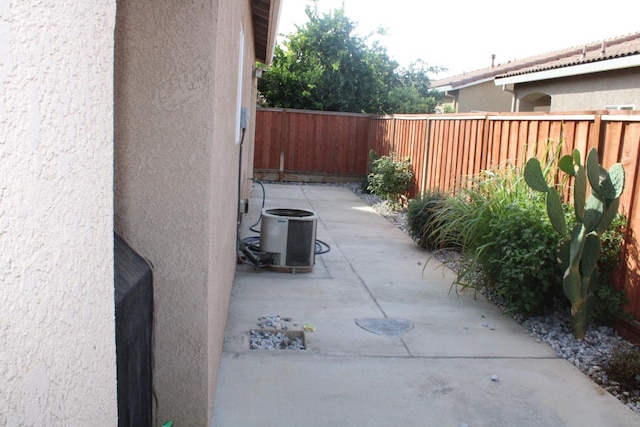 view of patio / terrace featuring cooling unit