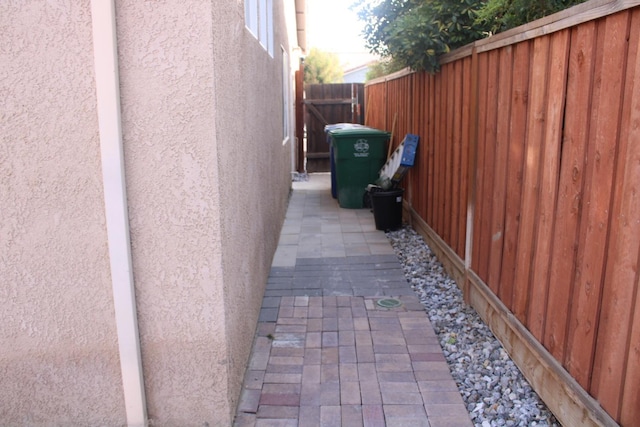 view of side of property featuring a patio