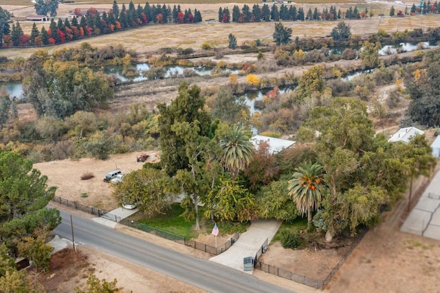 aerial view with a water view and a rural view