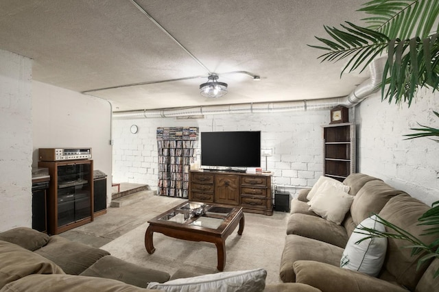 living room featuring a textured ceiling