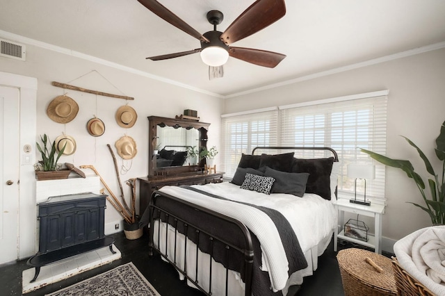 bedroom featuring ceiling fan and crown molding