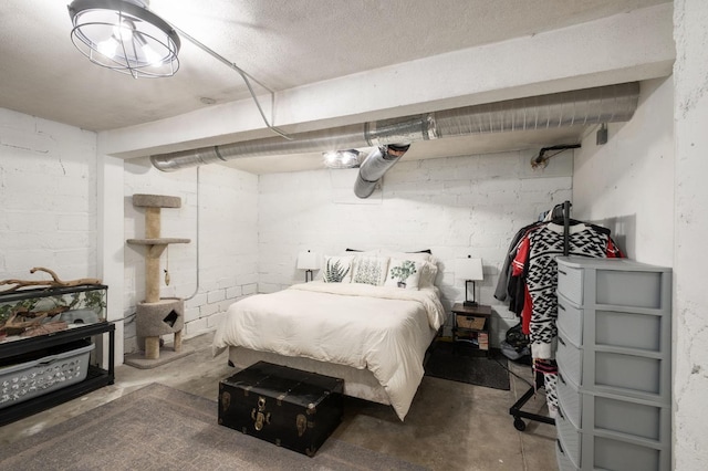 bedroom with concrete floors