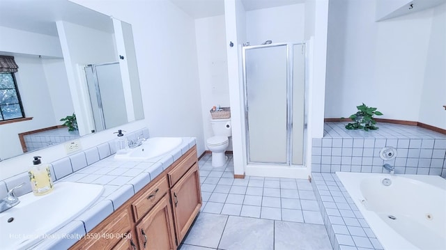 full bathroom with vanity, toilet, and independent shower and bath