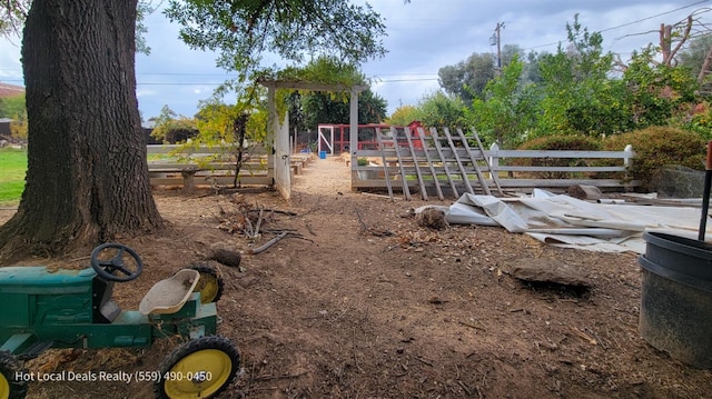 view of yard featuring a playground