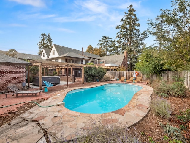 view of pool featuring a patio area, a pergola, and a hot tub