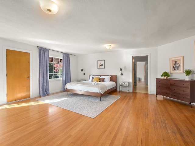 bedroom with light hardwood / wood-style flooring