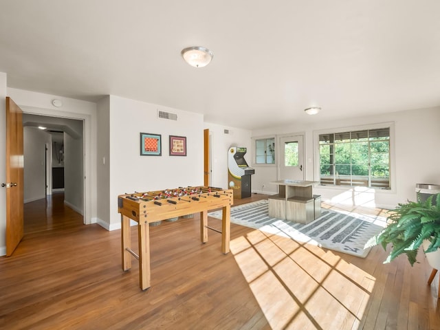 playroom with hardwood / wood-style flooring