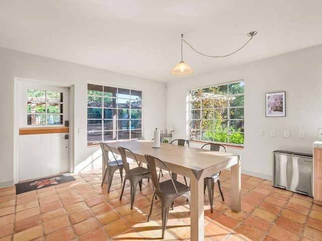 dining room featuring light tile patterned flooring