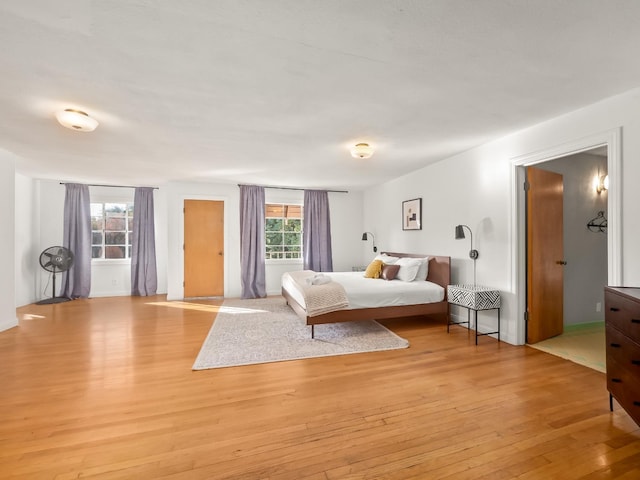 bedroom with light wood-type flooring