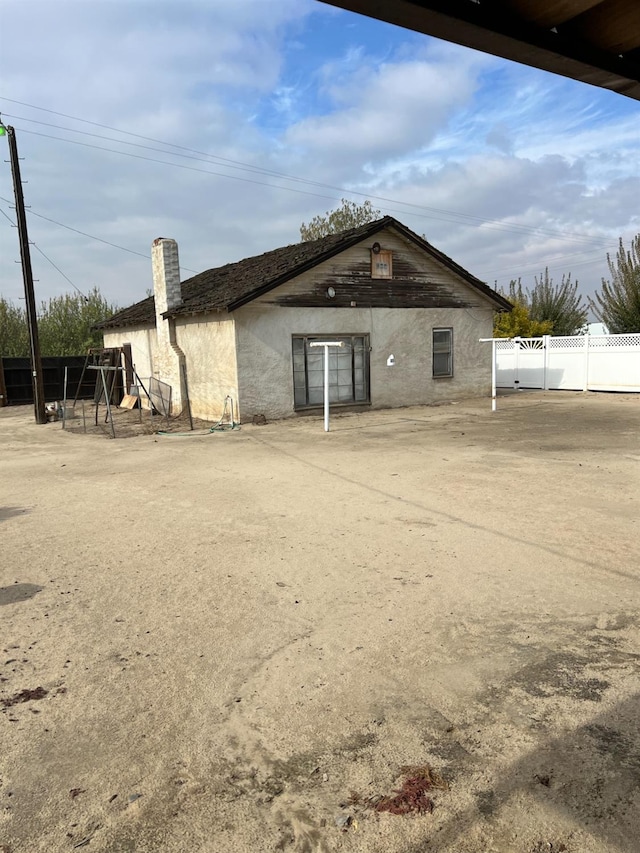 rear view of house with a patio area