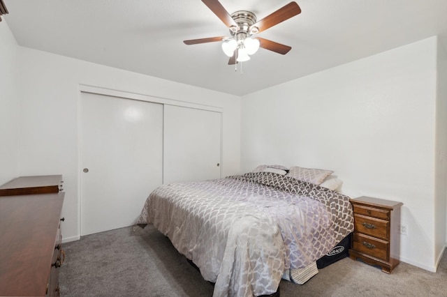 bedroom with light carpet, a closet, and ceiling fan