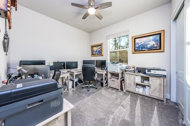 office with carpet and a ceiling fan