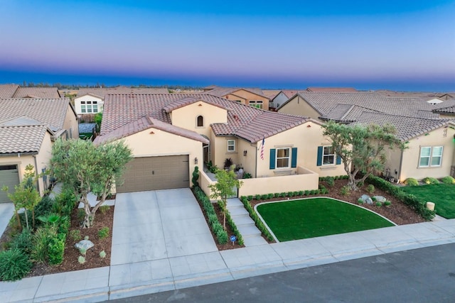 view of front of house with driveway, a residential view, a tiled roof, an attached garage, and stucco siding