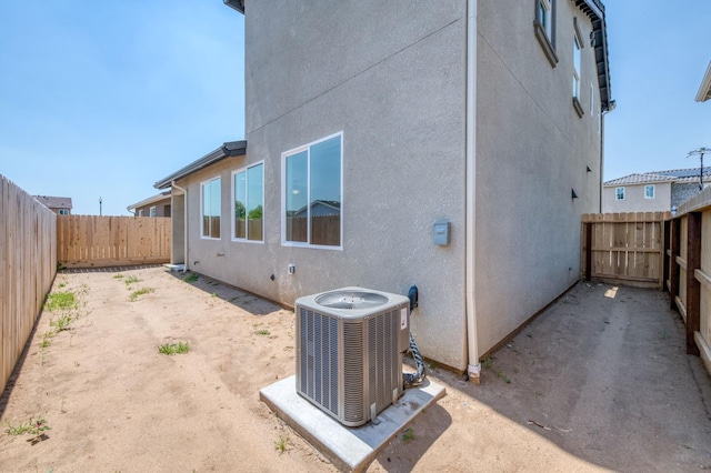 view of property exterior featuring central air condition unit