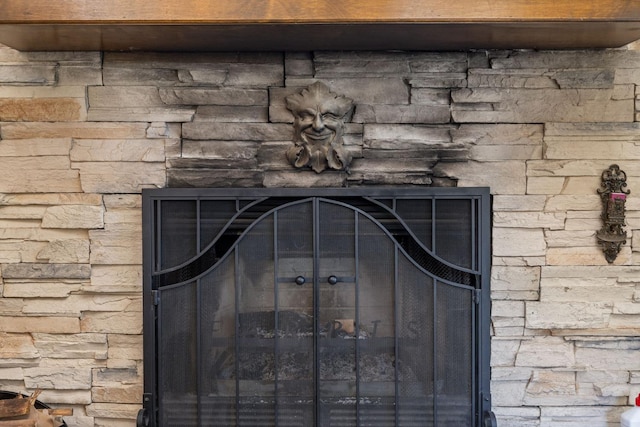 interior details with a fireplace