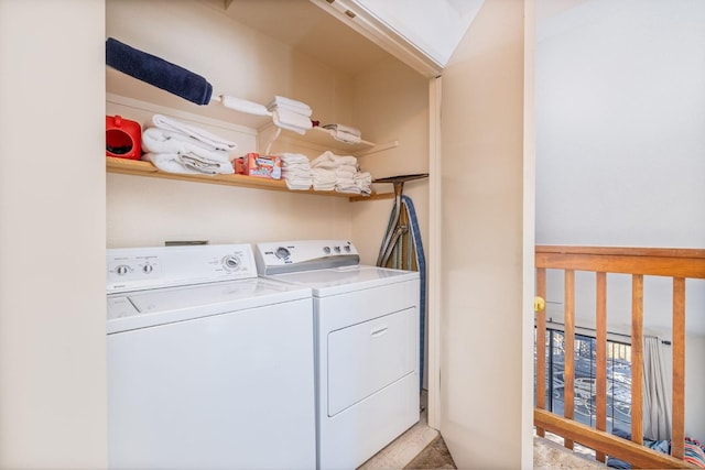 washroom with washer and clothes dryer