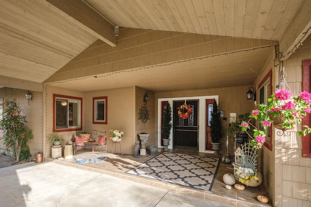 property entrance featuring a patio