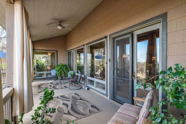 exterior space featuring plenty of natural light and lofted ceiling