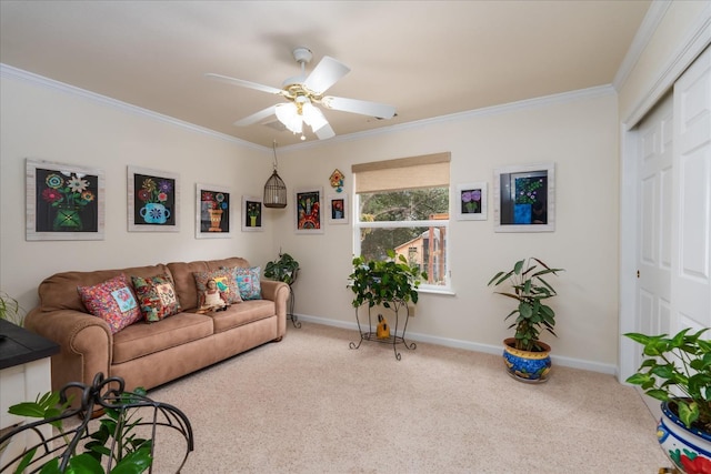 living room featuring ceiling fan, ornamental molding, and light carpet