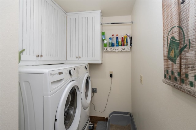 laundry room with cabinets and independent washer and dryer