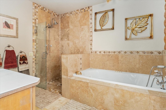 bathroom featuring tile patterned floors and shower with separate bathtub