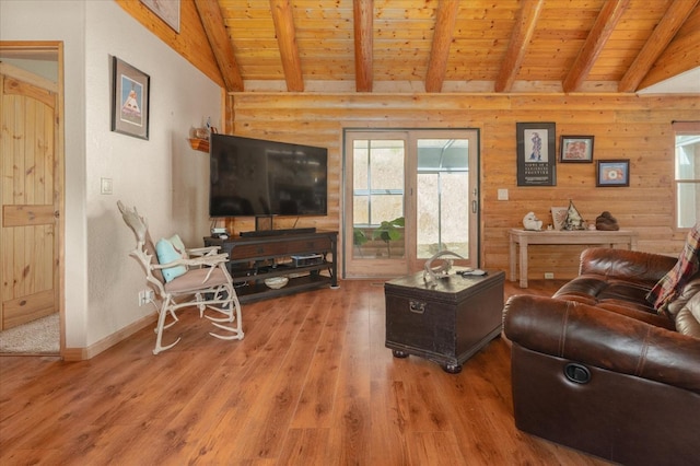 living room featuring wood ceiling, lofted ceiling with beams, wood walls, and wood-type flooring