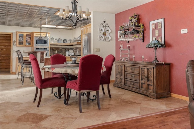 dining room with an inviting chandelier