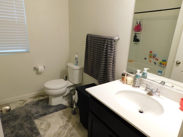 full bathroom with shower / tub combination, vanity, and toilet