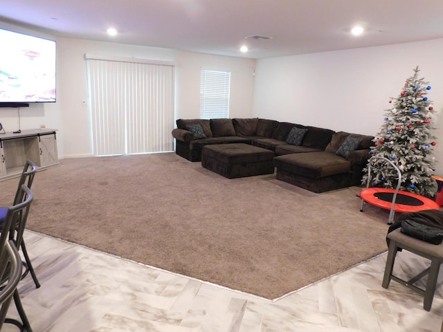 living room featuring light carpet