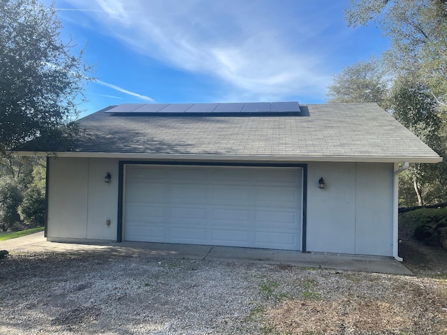 garage with solar panels