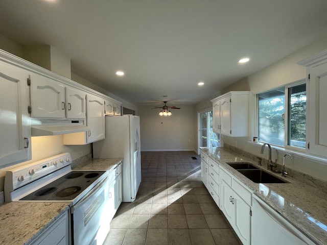 kitchen featuring sink, white cabinetry, white appliances, dark tile patterned flooring, and ceiling fan