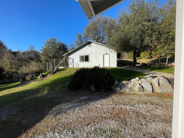 view of property exterior featuring a yard