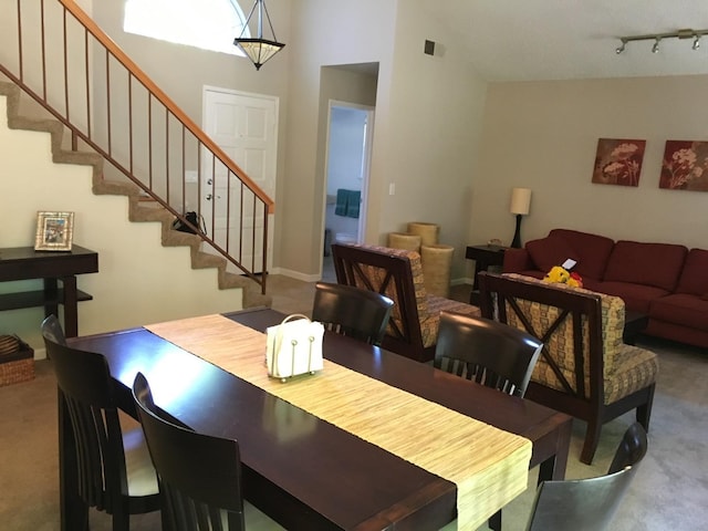 view of carpeted dining area