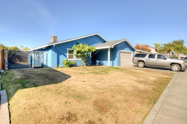 ranch-style house with a front lawn and a garage