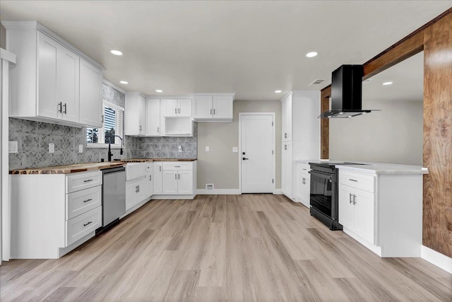 kitchen featuring dishwasher, ventilation hood, white cabinets, and black / electric stove