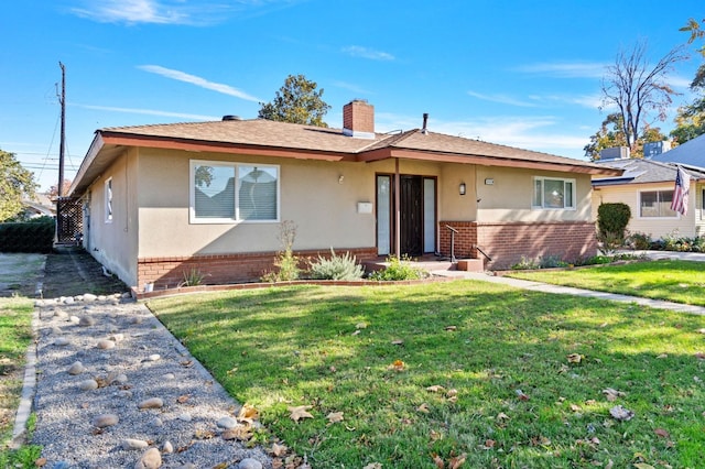 ranch-style house with a front yard