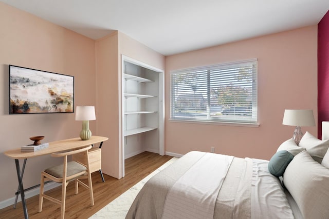 bedroom featuring light wood-type flooring