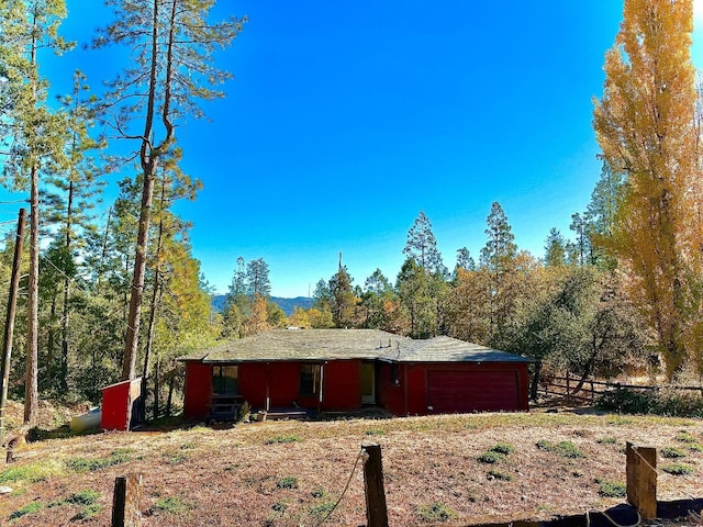 view of side of property featuring a garage