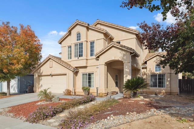 view of front of property with a garage