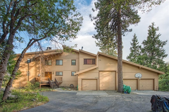 52180 Chahlip Ln, Shaver Lake, CA 93664 - view of front facade with a garage