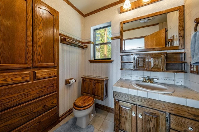 52180 Chahlip Ln, Shaver Lake, CA 93664 - bathroom with vanity, toilet, ornamental molding, tile patterned flooring, and tasteful backsplash