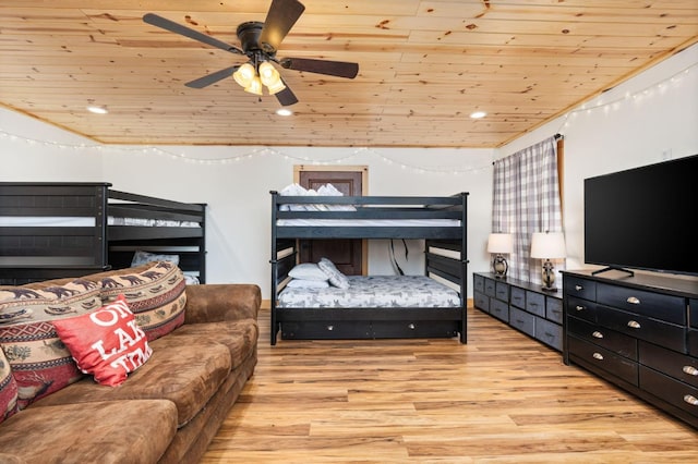 bedroom featuring lofted ceiling, light wood finished floors, wood ceiling, and recessed lighting