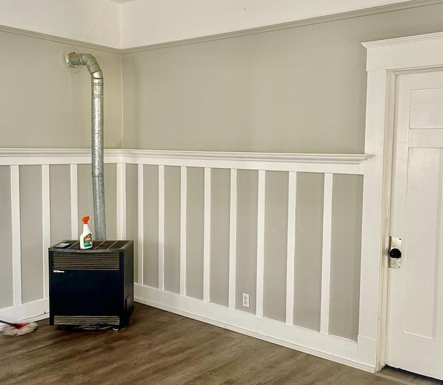 interior details with crown molding and wood-type flooring