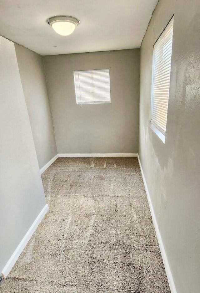 unfurnished room with carpet