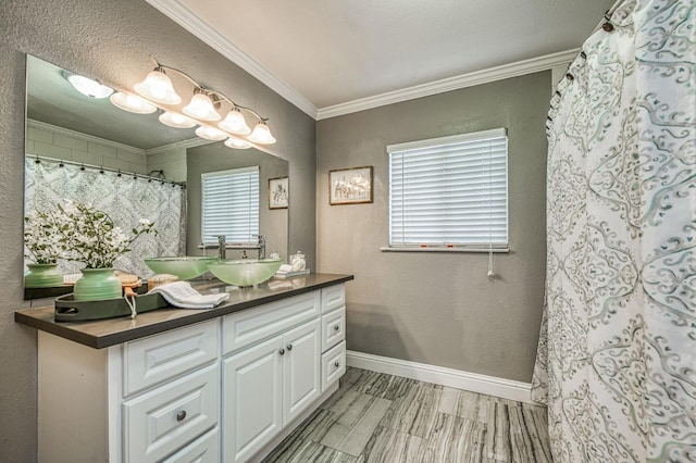 bathroom featuring vanity, hardwood / wood-style floors, and crown molding