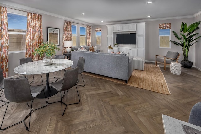 living room with dark parquet floors and crown molding